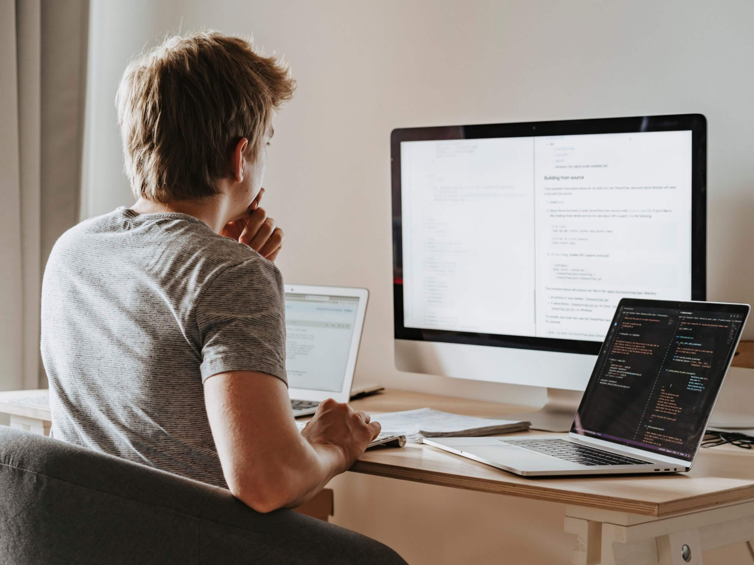 man on computers